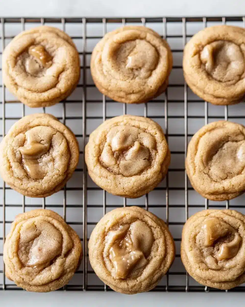 Chewy Maple Cinnamon Cookies with White Chocolate on a cooling rack