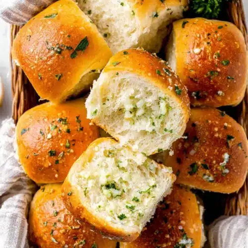 Garlic Bread Rolls 1 Delicious Garlic Bread Rolls, golden and fluffy, perfect for any meal.