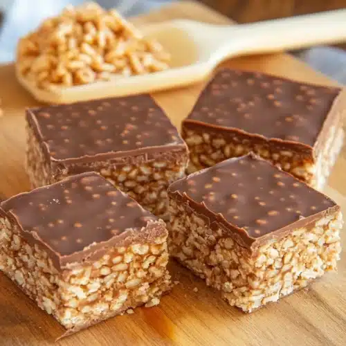 Delicious Mars Bar Holiday Squares, showcasing chocolatey layers and crispy rice texture.