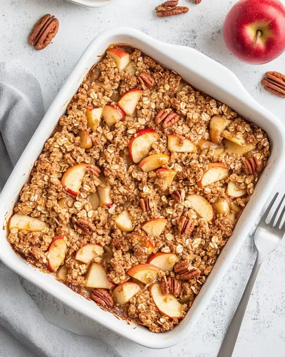 Delicious Oatmeal Apple Breakfast Bake featuring apples and pecans.