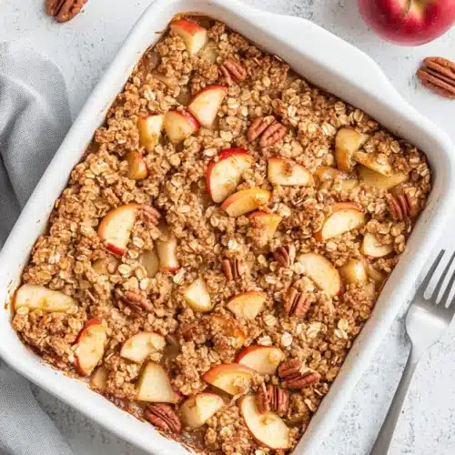 Delicious Oatmeal Apple Breakfast Bake featuring apples and pecans.