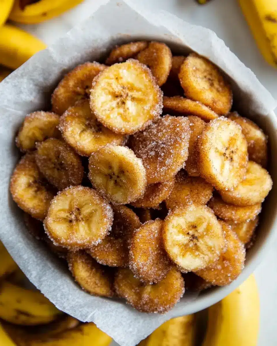 Sweet Cinnamon Air Fryer Banana Chips Sweet Cinnamon Air Fryer Banana Chips in a bowl with crispy texture.
