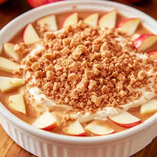 Cream Cheese Caramel Apple Dip 1 Cream Cheese Caramel Apple Dip served with apple slices.