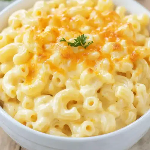 Crockpot Mac and Cheese 1 Crockpot Mac and Cheese with creamy texture and melted cheese.