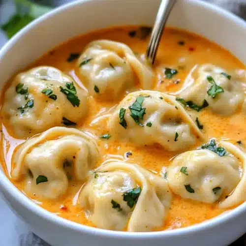 Delicious Curry Dumpling Soup with tender dumplings and cilantro.