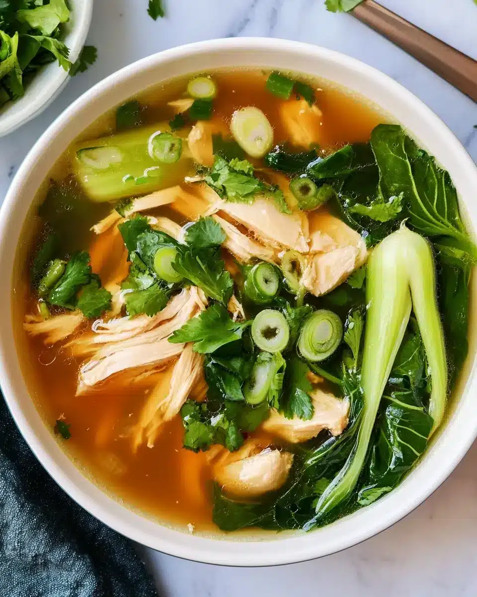 Hearty Bok Choy Chicken Soup Bowl Delicious Hearty Bok Choy Chicken Soup with vibrant greens and chicken.