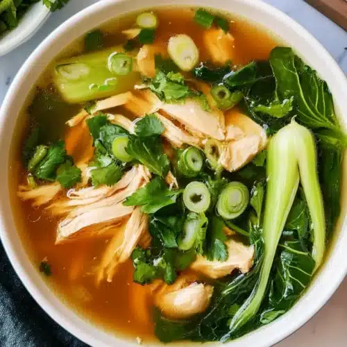 Hearty Bok Choy Chicken Soup 1 Delicious Hearty Bok Choy Chicken Soup with vibrant greens and chicken.