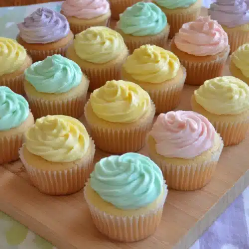 Colorful bridal shower cupcakes adorned with various frostings.