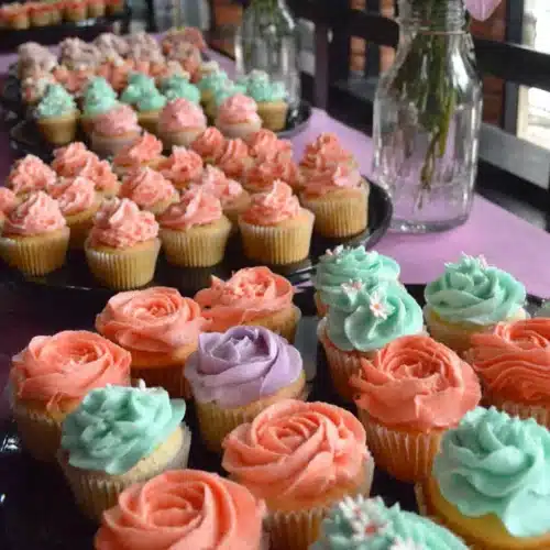 Colorful Flower Cupcakes That Will Brighten Your Day 1 Colorful flower cupcakes with vibrant frosting designs.
