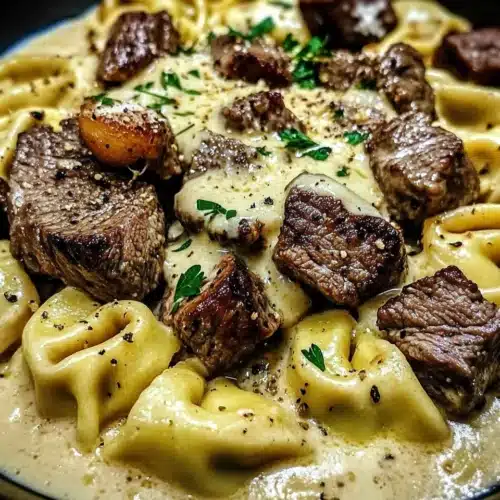 Garlic Parmesan Steak Tortellini in creamy sauce with tender steak.