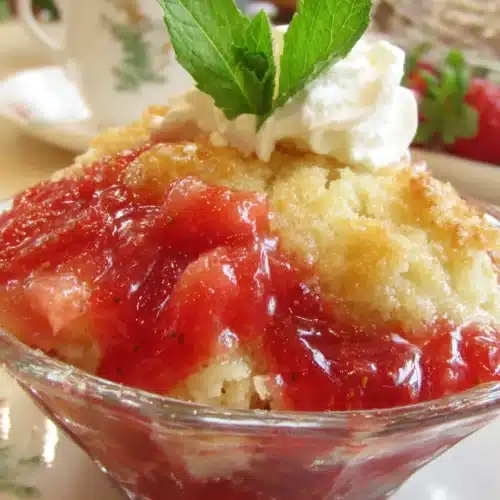Strawberry cobbler with juicy filling and golden topping.