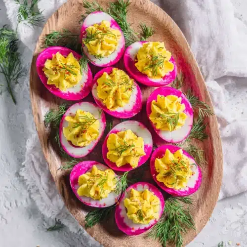 Colorful beet deviled eggs perfect for any occasion.