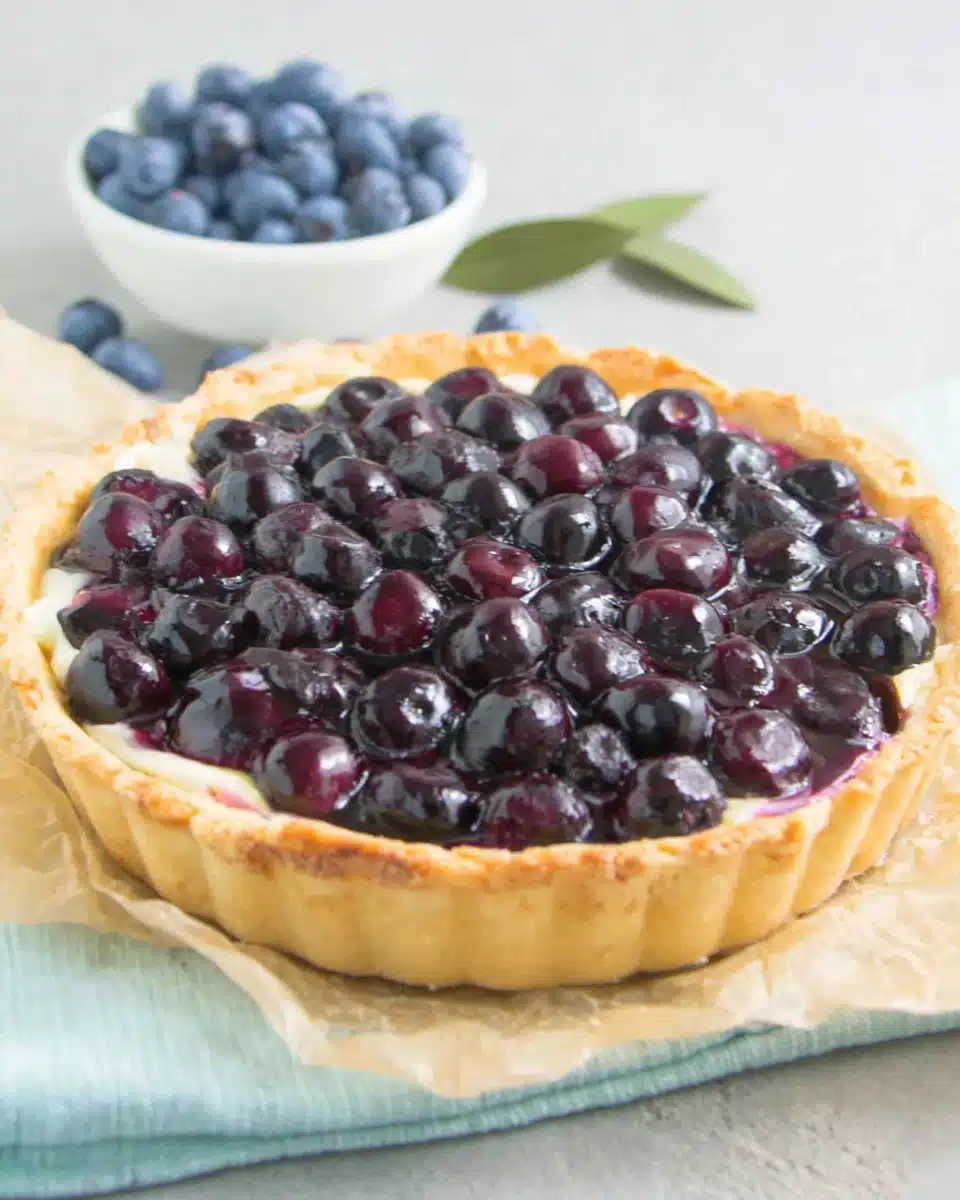 Delicious Blueberry Tart Recipe Blueberry tart with juicy filling and crispy crust.