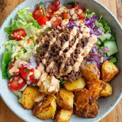 Burger Bowls: A Quick and Delicious Dinner Delight 1 Healthy burger bowls with potatoes, beef, and toppings.