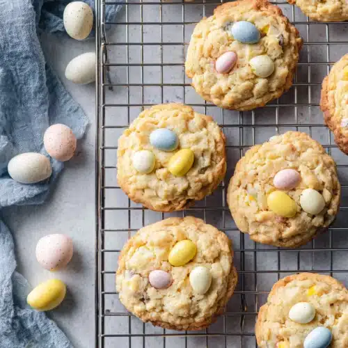 Delicious Cadbury Easter cookies with colorful chocolate eggs.