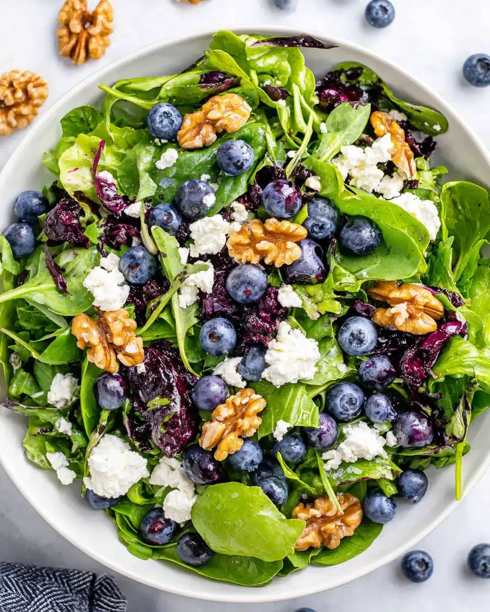 Delicious Easter salad with blueberries, goat cheese, and walnuts.