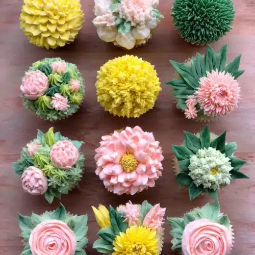 Stunning floral cupcakes decorated with colorful frosting.