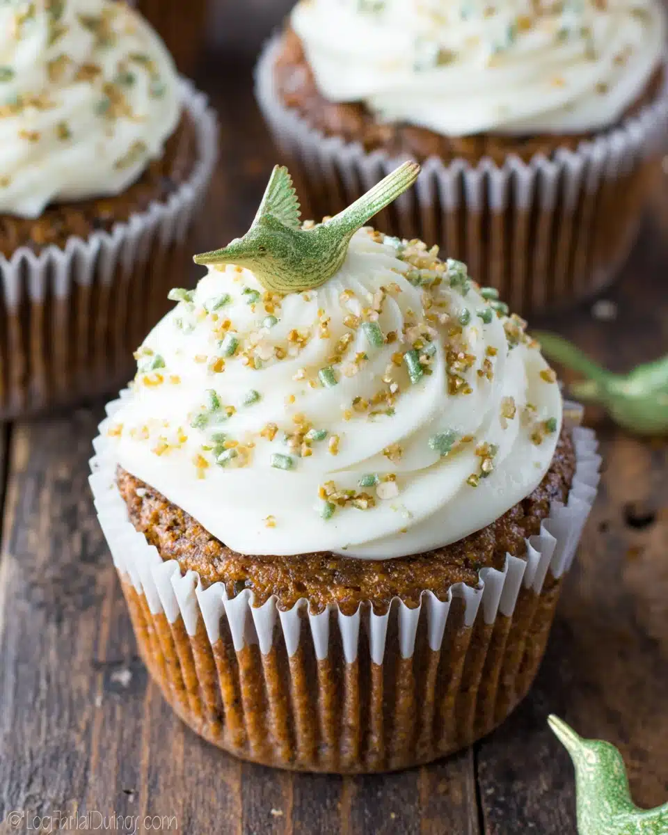Hummingbird cupcakes topped with delicious frosting and sprinkles.