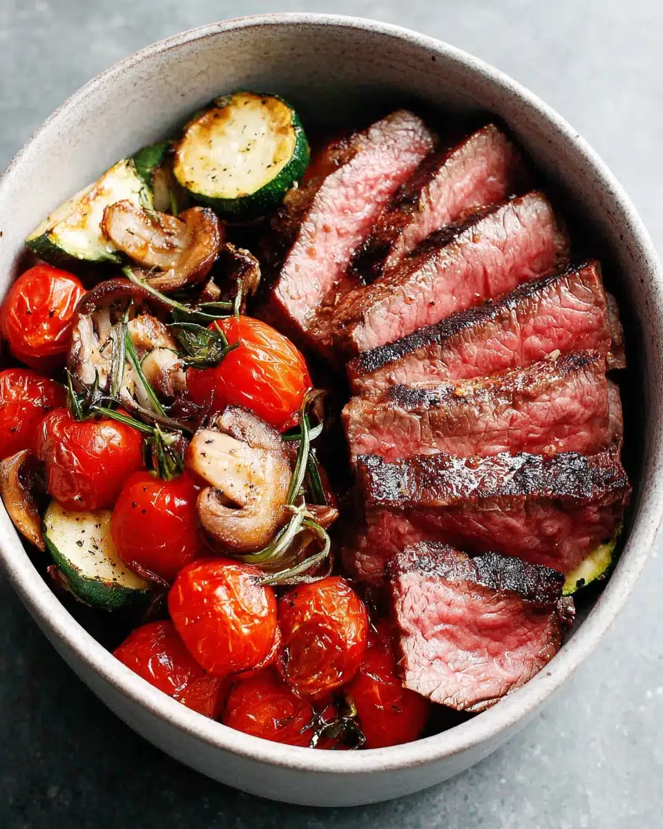 Mediterranean steak bowl with juicy steak and fresh vegetables.