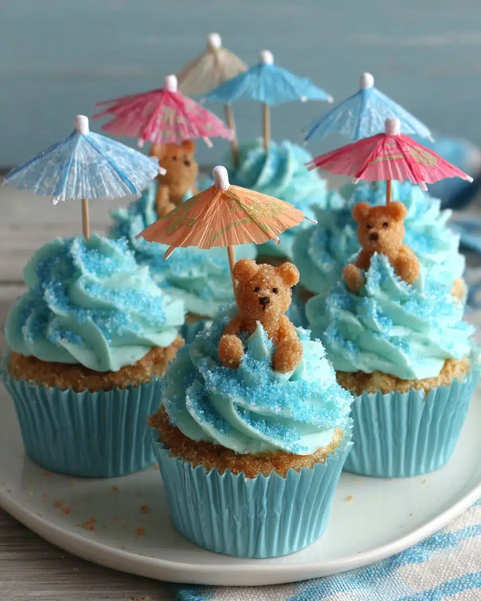 Moana cupcakes with vibrant blue frosting and cute decorations