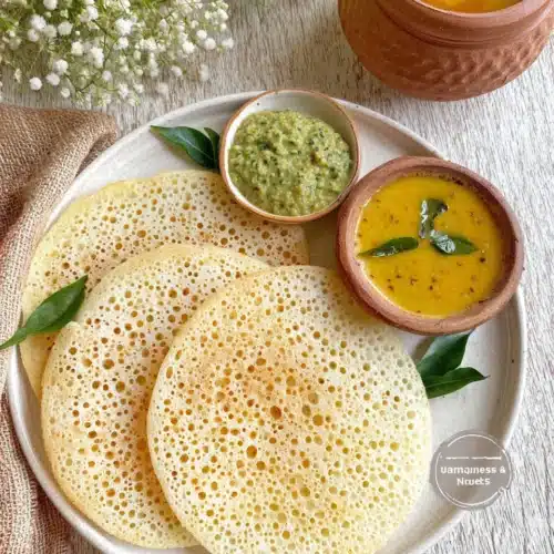 Delicious sponge dosa served with flavorful dips