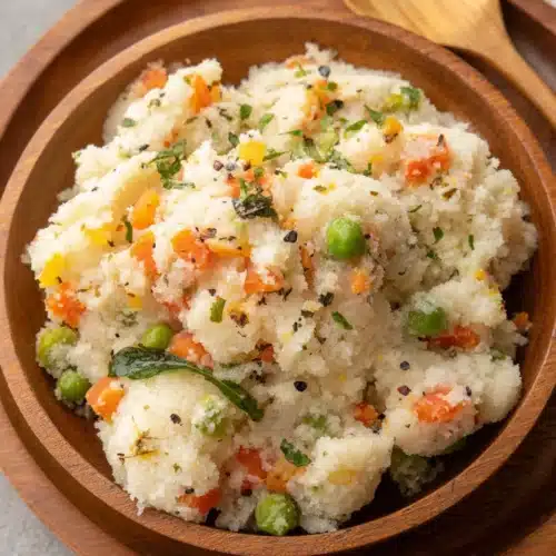 Delicious upma recipe packed with veggies for a healthy breakfast.