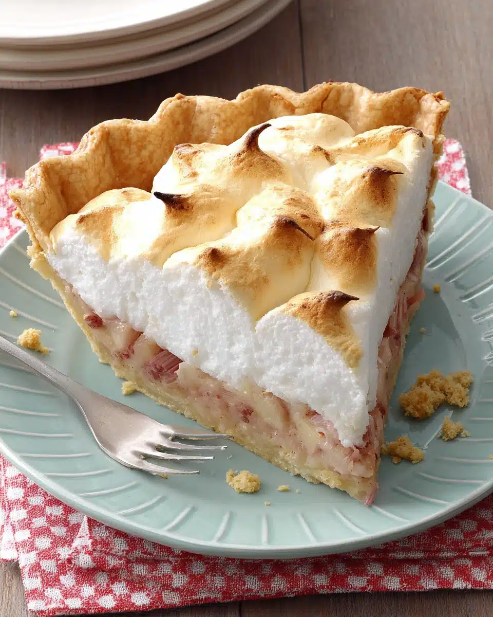 Contest winning rhubarb meringue pie with a golden crust