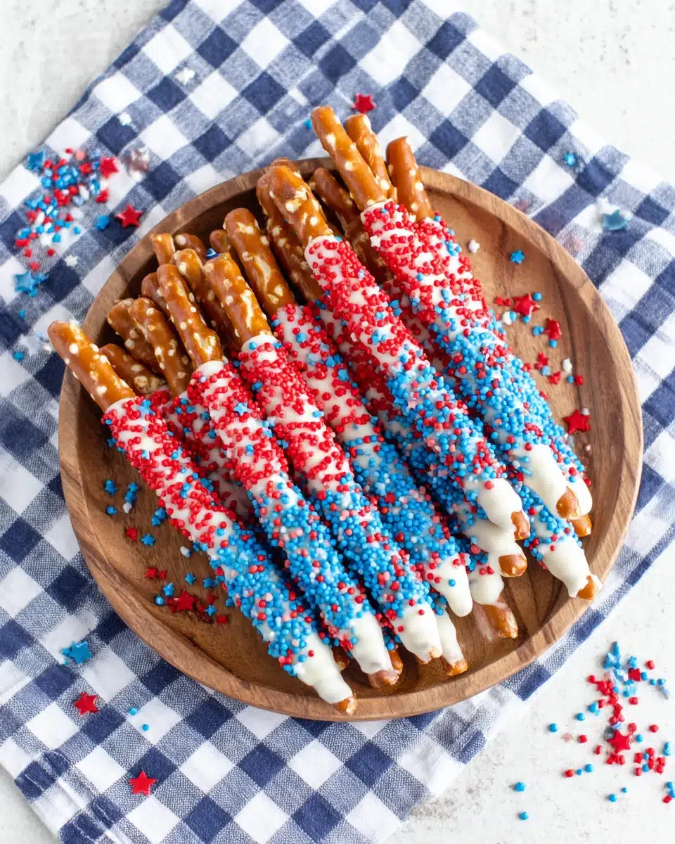 Fourth Of July Pretzel Rods decorated with vibrant colors.