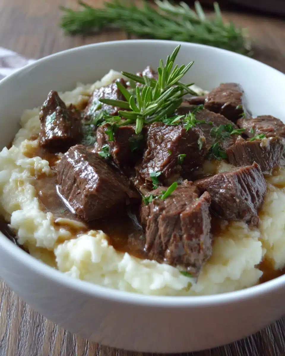 Garlic and rosemary beef served with mashed potatoes.