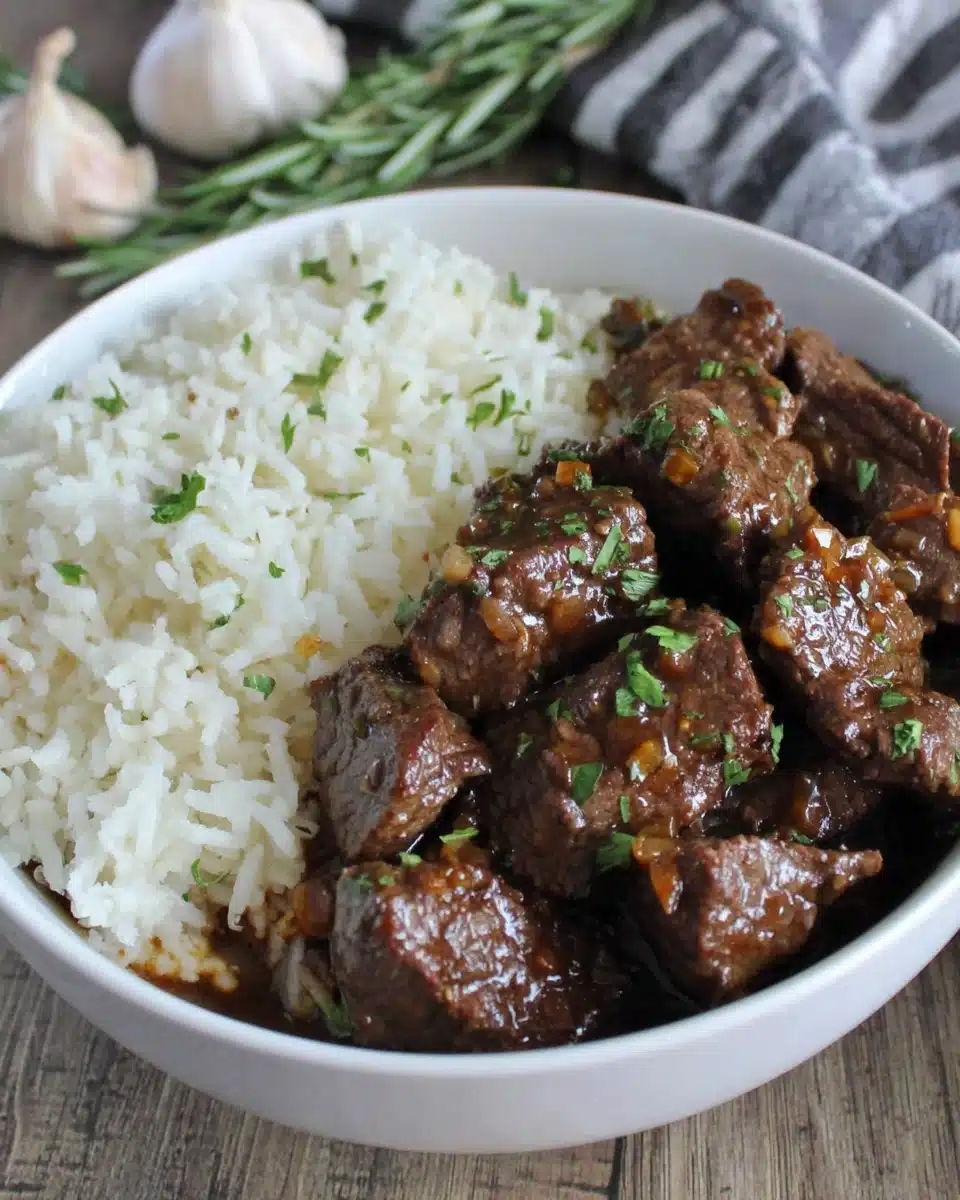 Savory garlic and rosemary beef with jasmine rice.