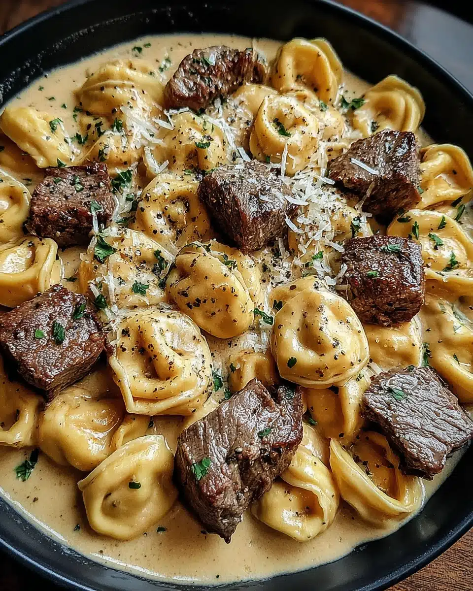 Savory Garlic Steak Tortellini Recipe Delicious garlic steak tortellini in creamy sauce.