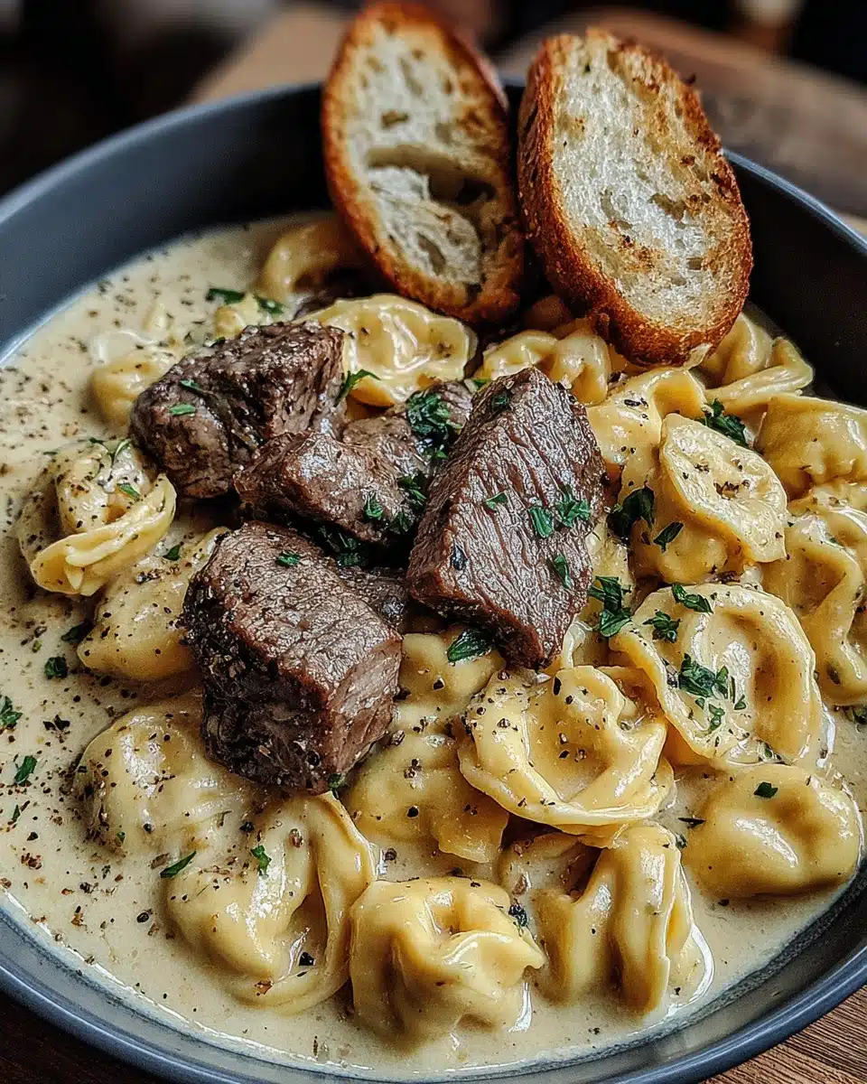 Creamy Garlic Steak Tortellini Recipe Savory garlic steak tortellini with creamy sauce and tender steak pieces.