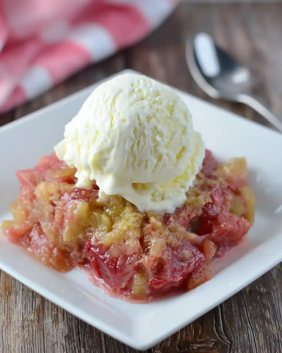Grandma's rhubarb dessert served warm with ice cream.