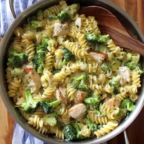 High protein rotisserie chicken broccoli pasta in a pot.