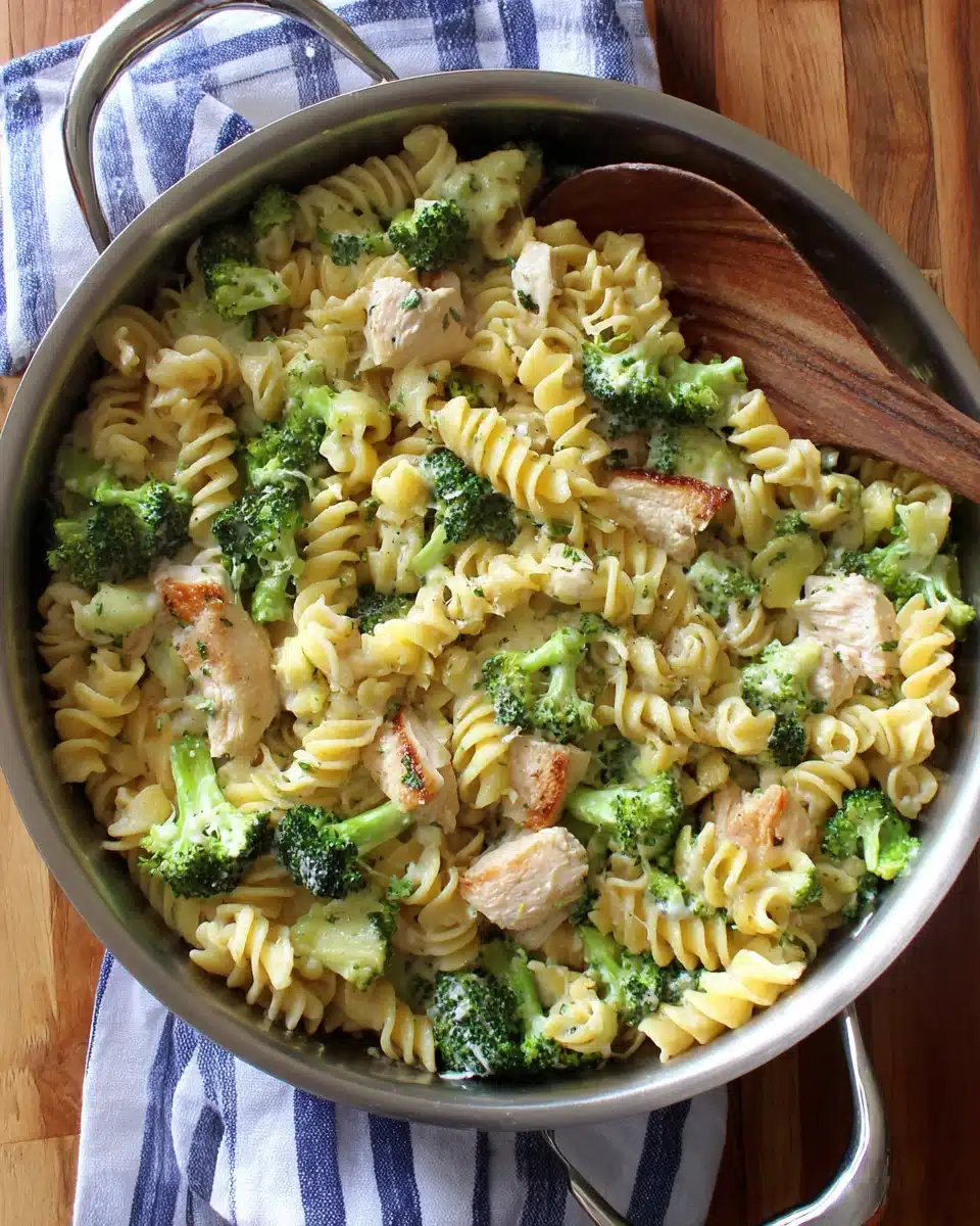 High protein rotisserie chicken broccoli pasta in a pot.