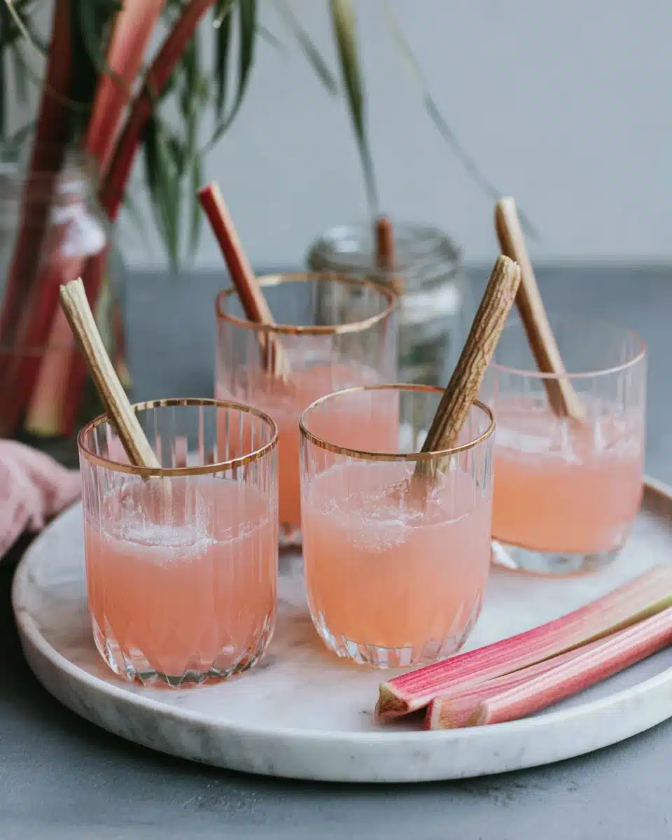 Refreshing homemade rhubarb lemonade served in glasses.