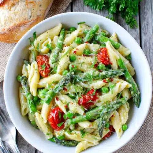 Pasta primavera in light cream sauce with fresh veggies.