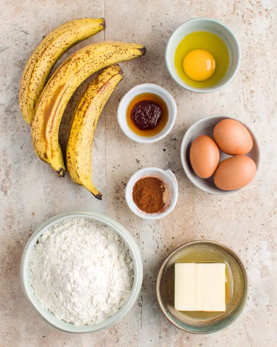 Sour Cream Banana Bread Ingredients Ingredients for sour cream banana bread laid out on a counter.