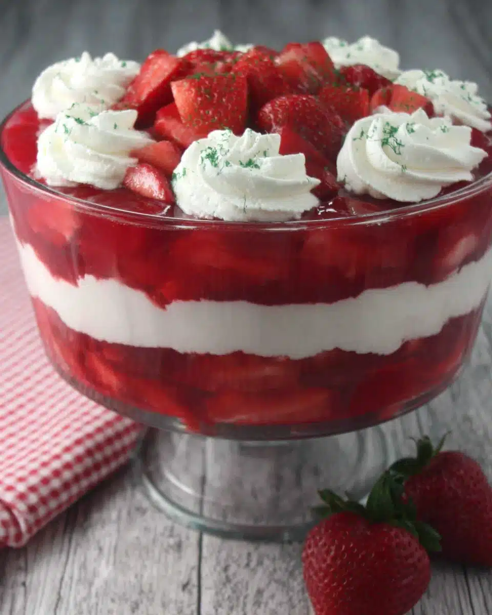 Refreshing summertime strawberry mousse dessert in a trifle bowl.