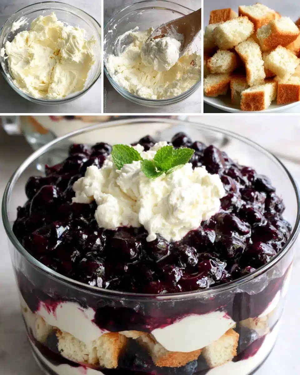 Blueberry cheesecake trifle layers with angel food cake, cream cheese filling, and blueberry topping in a glass bowl.