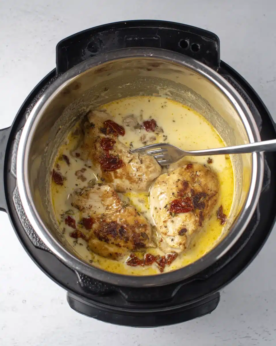 Crock pot marry me chicken with creamy sauce and seared chicken breasts