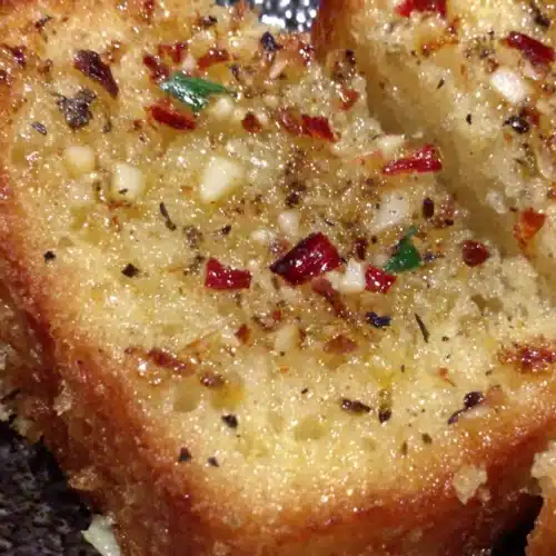 Heavenly garlic bread with crispy golden crust and red pepper flakes
