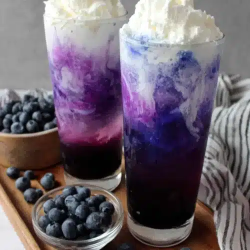 Sugar free blueberry italian cream soda with whipped cream and fresh blueberries