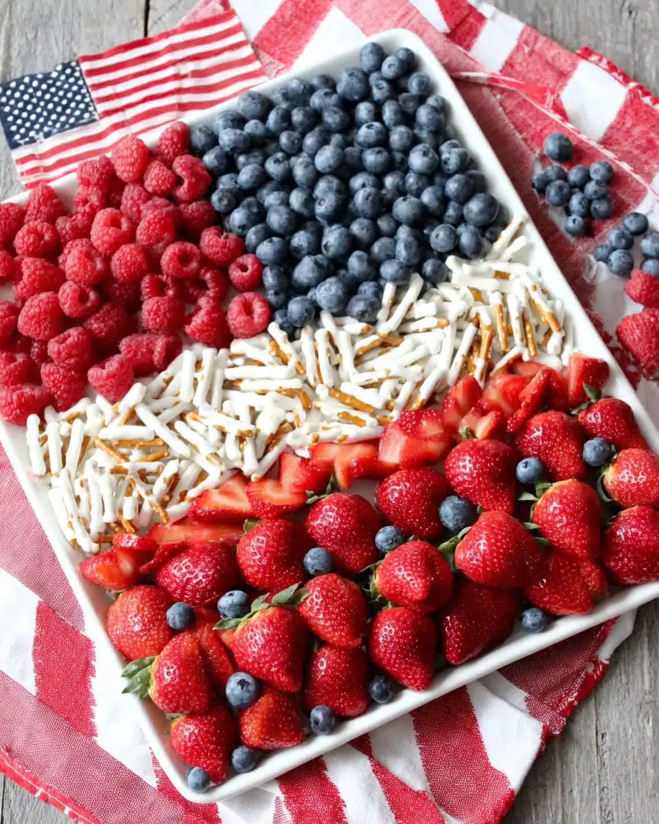 American Flag Fruit Tray with Berries and Pretzels American flag fruit tray with strawberries, raspberries, blueberries, and yogurt-covered pretzels