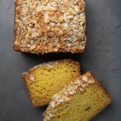 Mango Bread: A Delightful Tropical Indulgence 2 Mango bread with toasted coconut, served with coffee and champagne