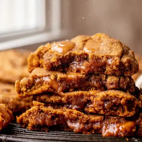 Caramel pumpkin cake cookies with gooey caramel filling and cinnamon sugar coating
