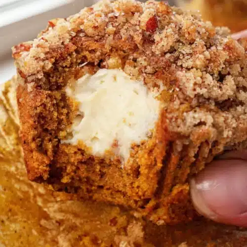 Cheese Pumpkin Muffins: Delightfully Indulgent and Easy 2 Cheese pumpkin muffin with cream cheese filling and streusel topping